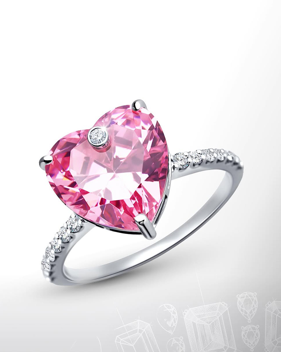 Nhà mốt Sokolov đặt tất cả tình yêu và sự ngưỡng mộ vào việc tạo ra chiếc nhẫn Sapphire hồng được cut-out hình trái tim lớn cùng những viên kim cương nặng 0.005 carat