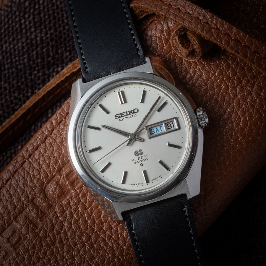 Grand Seiko hi beat 3600 máy 6146-8000 (có lịch thứ - ngày)