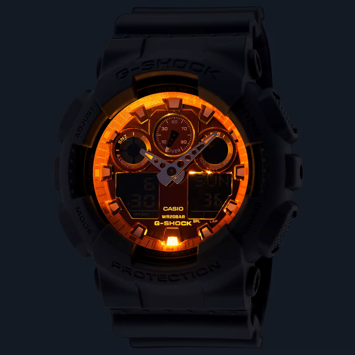Đèn led trên mặt số G-Shock GA-100 phát sáng trong bóng tối với đèn màu cam.
