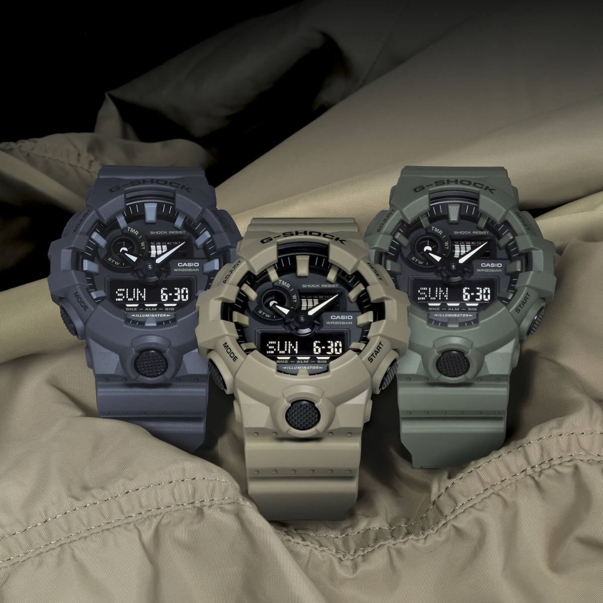 Ba mẫu G-Shock GA-700 phối màu xanh xám, be và xanh rêu theo phong cách outdoor.