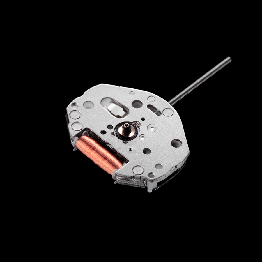 chi tiết bộ máy Miyota Caliber 2035 chạy pin với thiết kế tấm kim loại màu bạc.