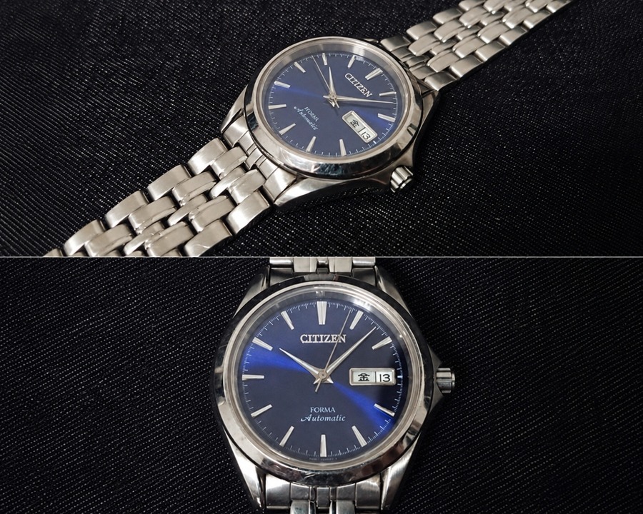 Hai góc độ khác nhau của một chiếc đồng hồ nam Citizen Forma Automatic cổ điển đặt trên nền vải đen.