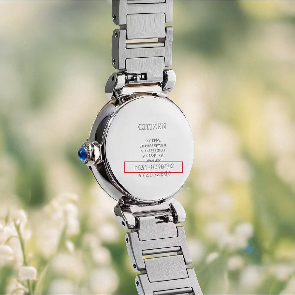 Nắp đáy đồng hồ Citizen nữ hiển thị thông số bộ máy Caliber E031 chính hãng.