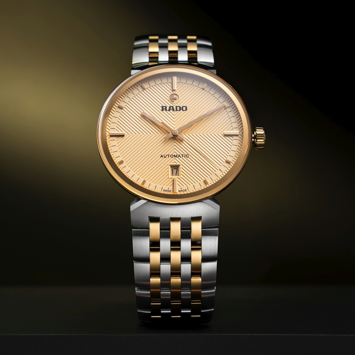 Đồng hồ R48903253 mặt số 39mm mạ vàng sang trọng.