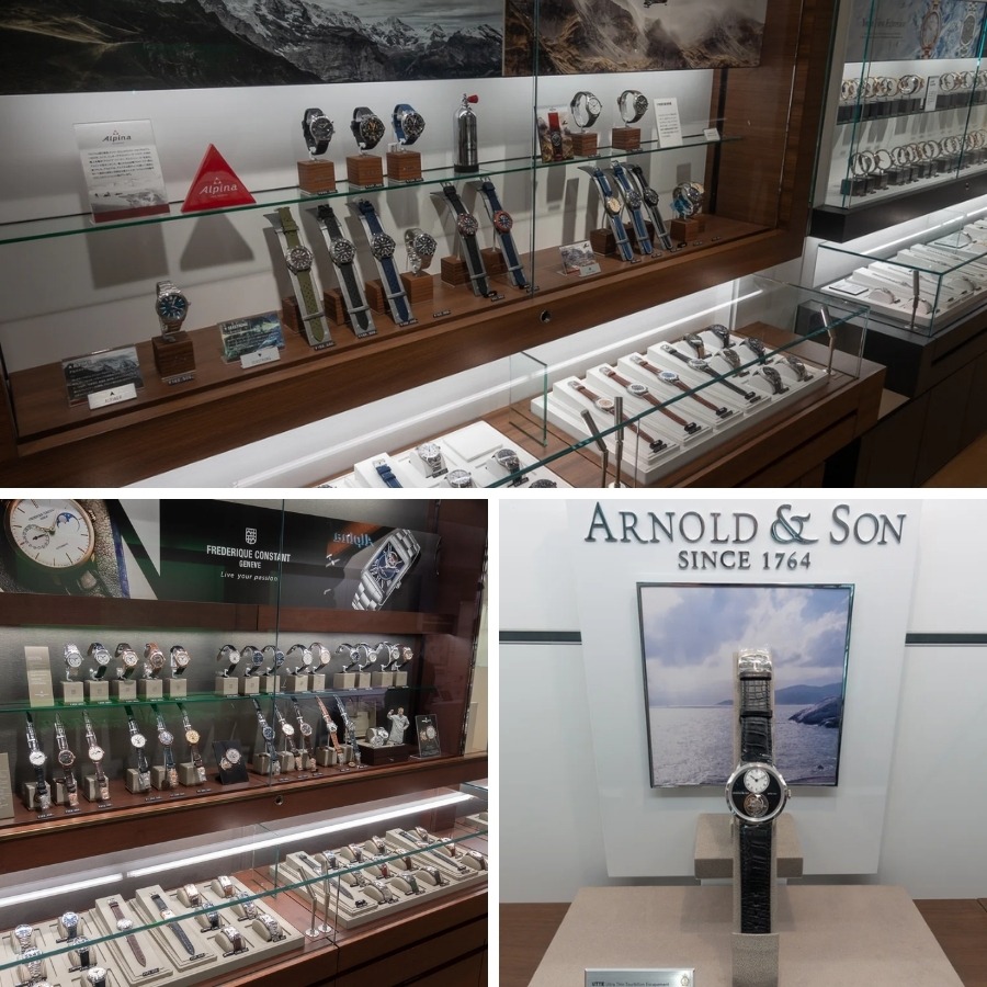 Quầy trưng bày các thương hiệu Alpina, Frederique Constant và Arnold & Son được sắp xếp gọn gàng trong các tủ kính lót gỗ.